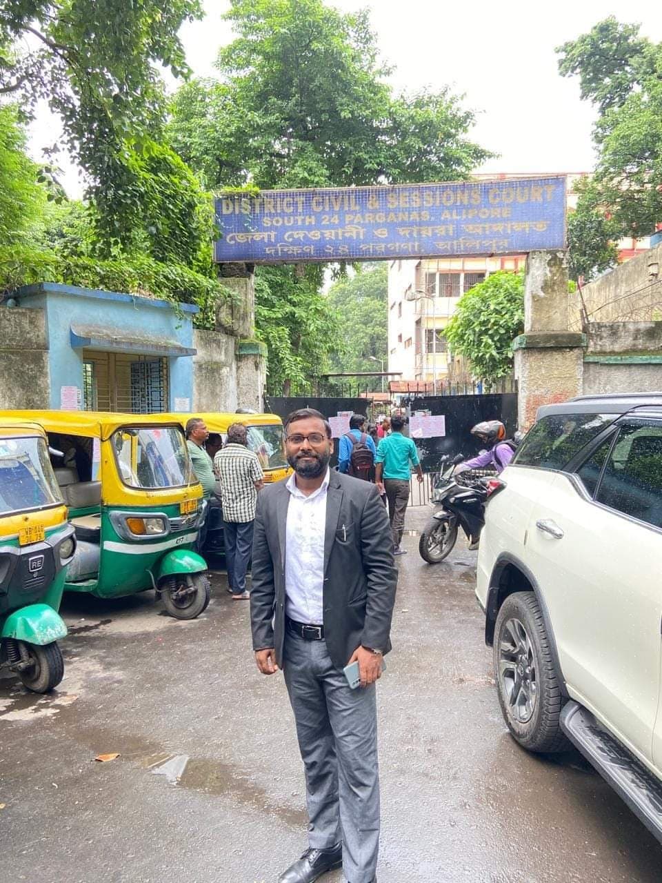 Advocate Shubham Singh standing before the entrance of District Civil & Sessions Court, Alipore