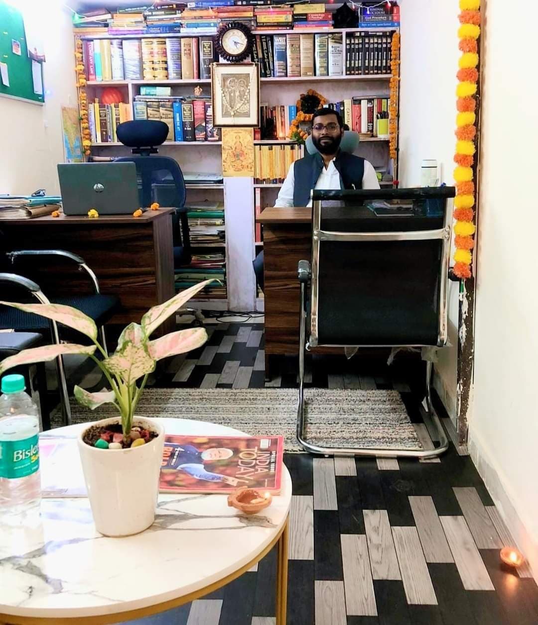 Advocate Shubham Singh at his chambers workstation decorated for Diwali
