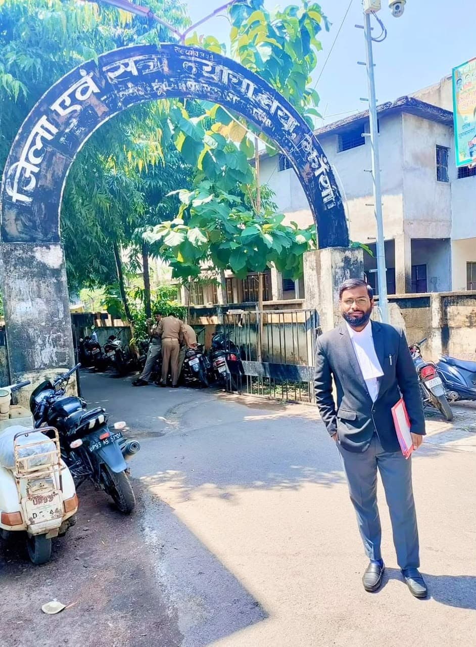 Advocate Shubham Singh at District & Sessions Court complex holding case brief